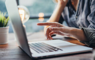 Reviewing a contract on a laptop