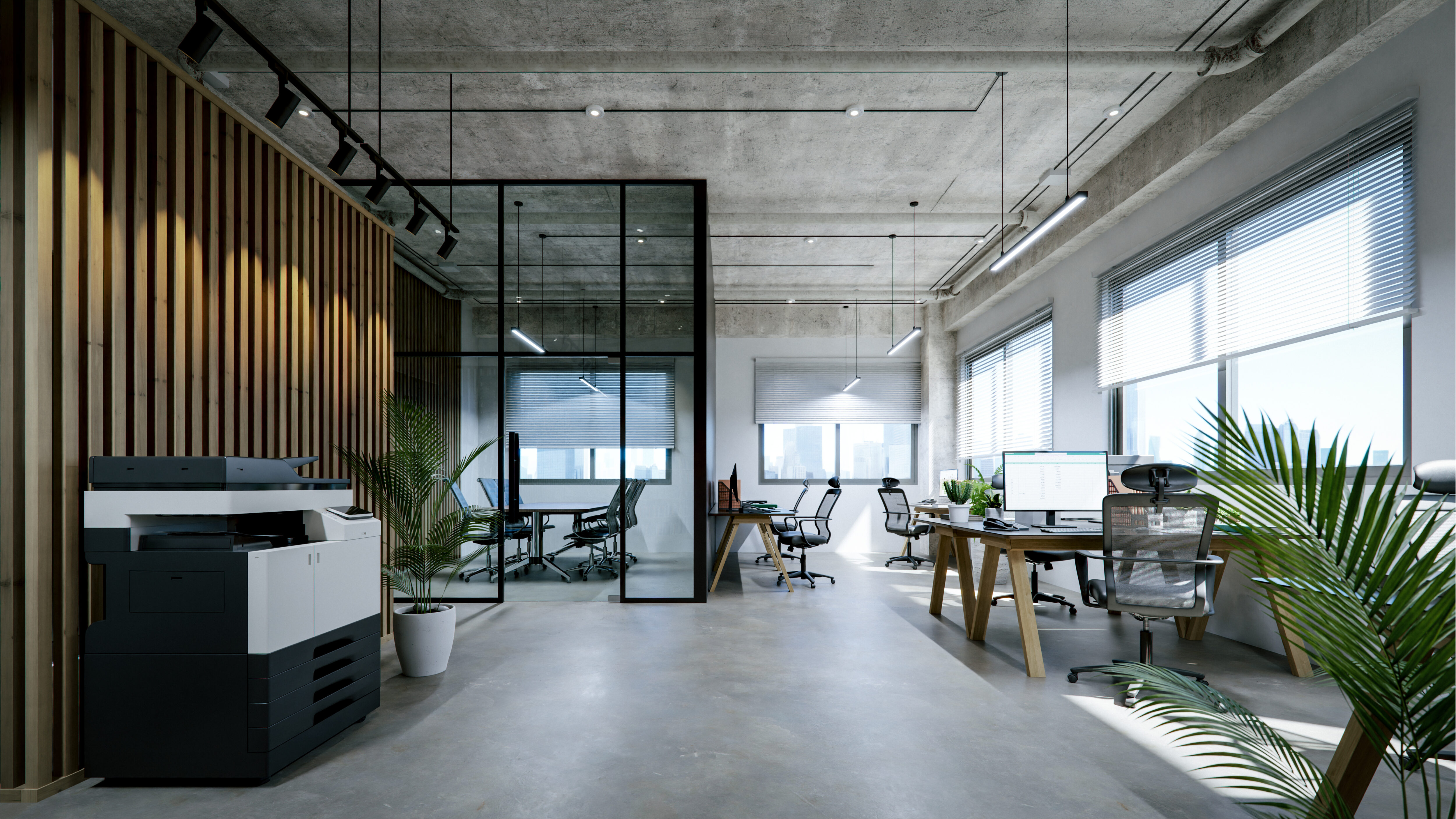 Modern office interior with exposed concrete ceiling and floor.