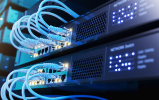 Network switch and network cables in modern server room